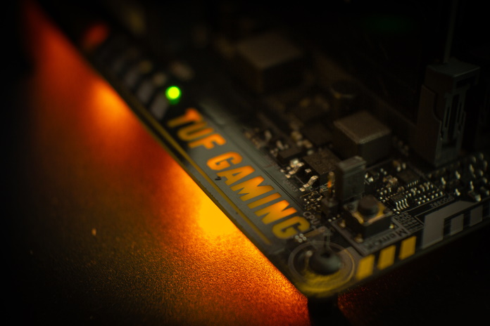 RGB-LED illuminated TUF Gaming logo on a motherboard