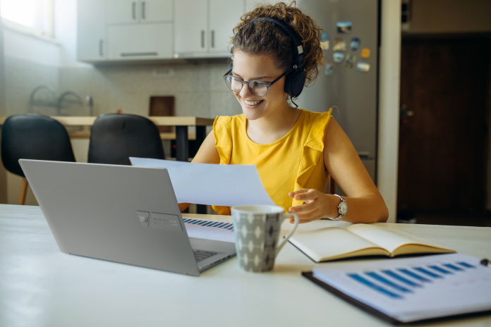 Woman using Vivobook laptop