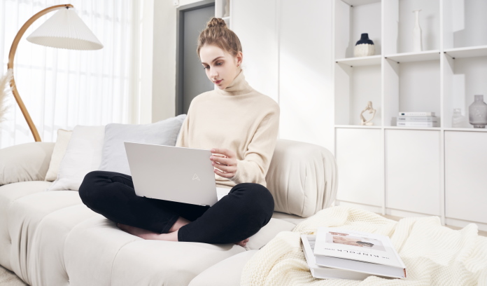 Woman using Zenbook S laptop