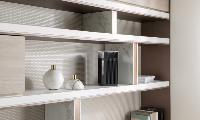 ZenWiFi mesh router on shelf with other decorative items