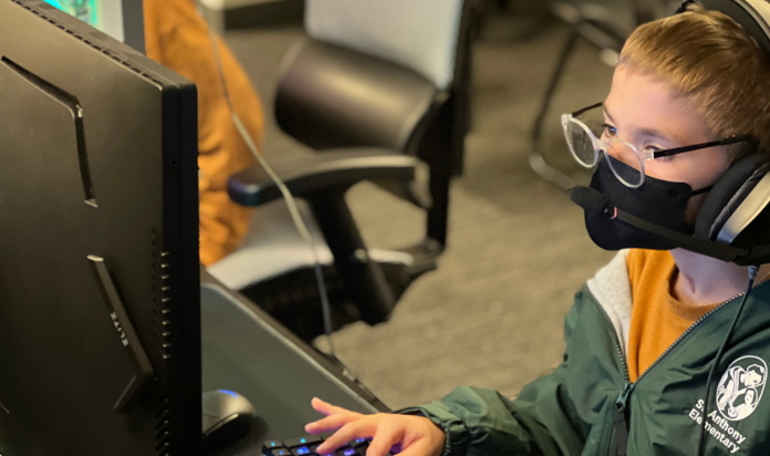 A child using a computer in an enrichment center