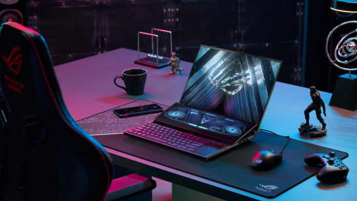 Man playing a game on the ROG Zephyrus Duo 16 laptop