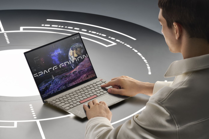 Man using Zenbook 14X OLED Space Edition laptop