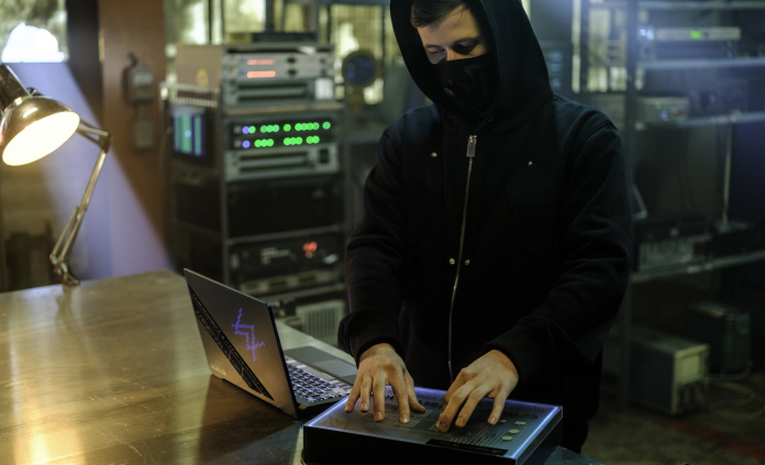 Alan Walker using the ROG Zephyrus G14 Alan Walker Special Edition gaming laptop