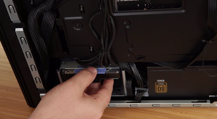 Installing a storage drive into the tool-free drive bay