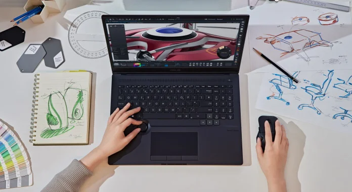 Creator using the ASUS Dial to create content on the ProArt Studiobook Pro 16