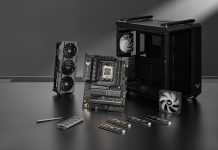 TUF Gaming GT502 chassis on a table with a variety of PC DIY components from TUF Gaming