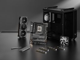 TUF Gaming GT502 chassis on a table with a variety of PC DIY components from TUF Gaming