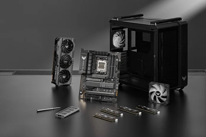 A TUF Gaming motherboard, graphics card, case, and fans, along with other elements for a PC build