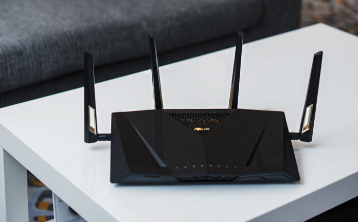 ASUS RT-AX88U wireless router sitting on a table