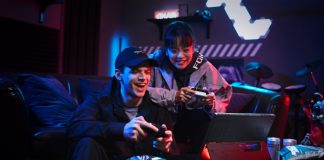 Boy and girl playing PC games together using the ROG Flow Z13 gaming laptop
