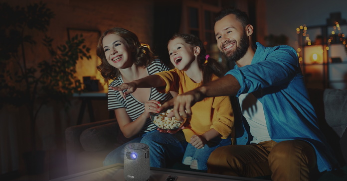 Family enjoying a video together the the ZenBeam Latte L1