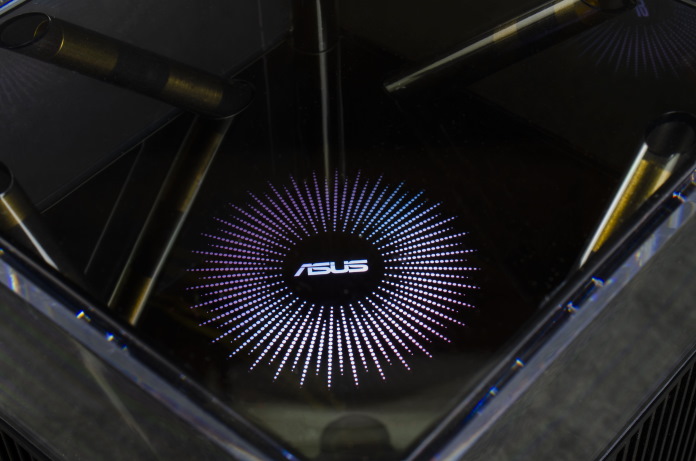 ASUS logo inside the glass top element of the ZenWiFi Pro ET12