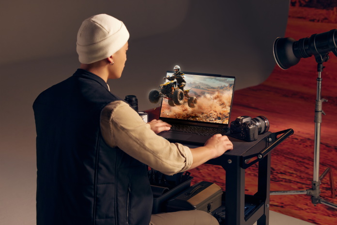 Young person working in a video recording studio using ASUS Spatial Vision tech 