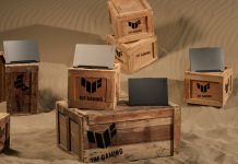 A selection of 2023 TUF Gaming laptops arranged on crates