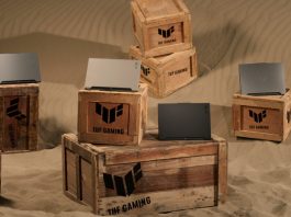 A selection of 2023 TUF Gaming laptops arranged on crates