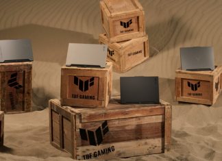 A selection of 2023 TUF Gaming laptops arranged on crates