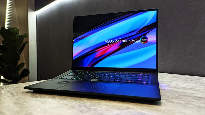 Front view of the Zenbook Pro 16X OLED laptop sitting on a table 