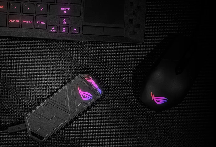 ROG Strix Arion on a desk with ROG mouse and laptop
