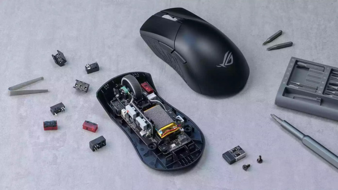 ROG Gladius III Wireless mouse open and being customized with new switches in its push-fit sockets
