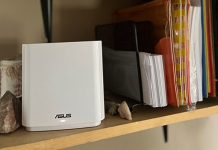 ASUS ZenWiFi XT9 mesh WiFi system on a bookshelf