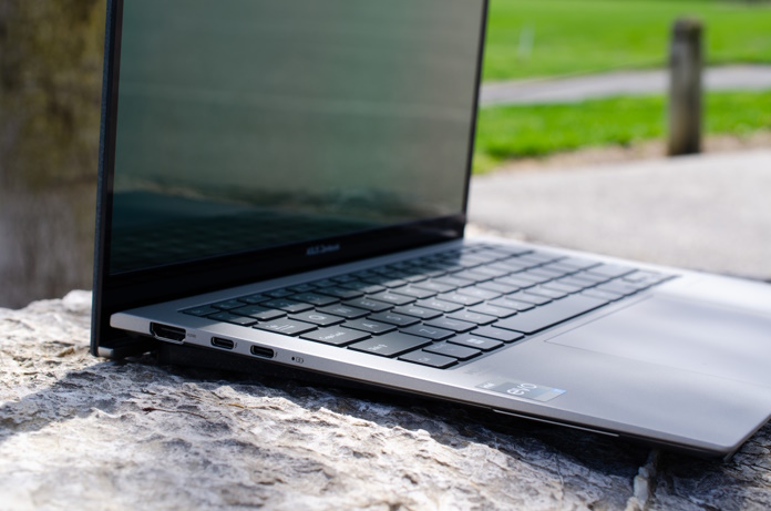 Zenbook S 13 OLED sitting on a stone 