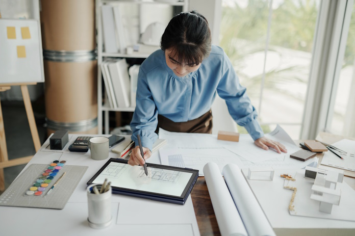 A woman working on an architecture project