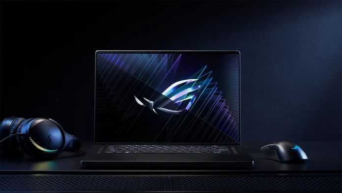 ROG Zephyrus M16 gaming laptop with an ROG mouse and headset sitting on a desk
