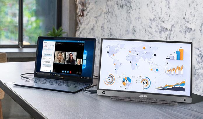 ASUS laptop and the ZenScreen MB16AH portable monitor sitting on a table