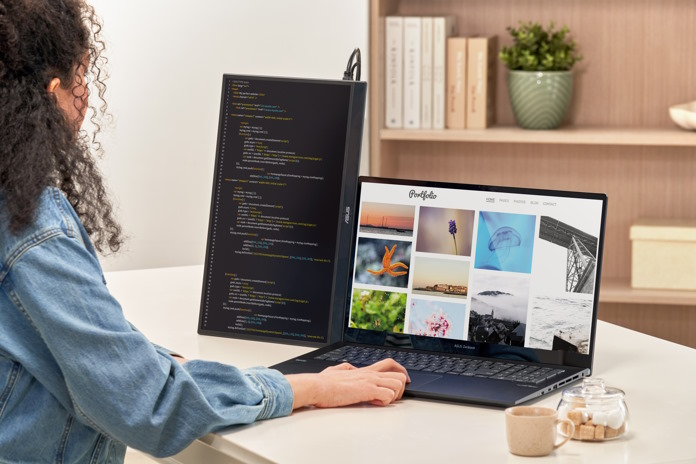 An ASUS ZenScrren MB16QHG in vertical orientation on a desk 