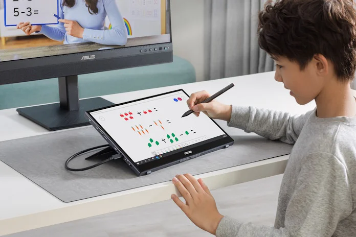 A young man learning math using the ZenScreen portable monitor and a stylus