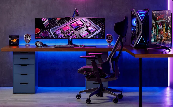 A gaming setup featuring the super-ultra-wide ROG XG49WCR monitor