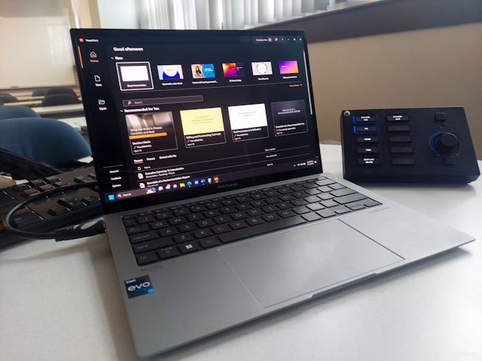 Laptop connected to a display setup in a college classroom