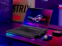 The ROG Strix G16 gaming laptop on a gaming desk with an ROG Gladius III Wireless mouse