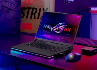 The ROG Strix G16 gaming laptop on a gaming desk with an ROG Gladius III Wireless mouse