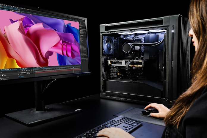 A woman using a workstation PC equipped with a ProArt GeForce RTX 4060 Ti 16GB graphics card