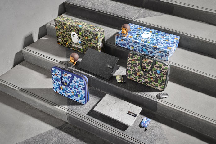 The laptop, accessories, bag, and packaging for the both the silver and black editions of the Vivobook S 15 OLED BAPE Edition 