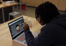 A student at McDaniel High School using the ASUS Chromebook CX34 Flip to develop pixel art with a stylus