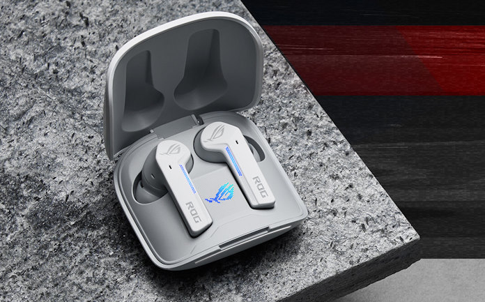 A closeup view of the ROG Cetra TWS earbuds in their charging case on a marble table