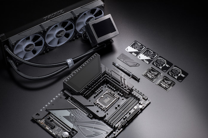 The ROG Maximus Z790 Dark Hero motherboard, ROG Thermal Paste Kit, and ROG Ryujin III 360 AIO liquid cooler sitting separately on a table