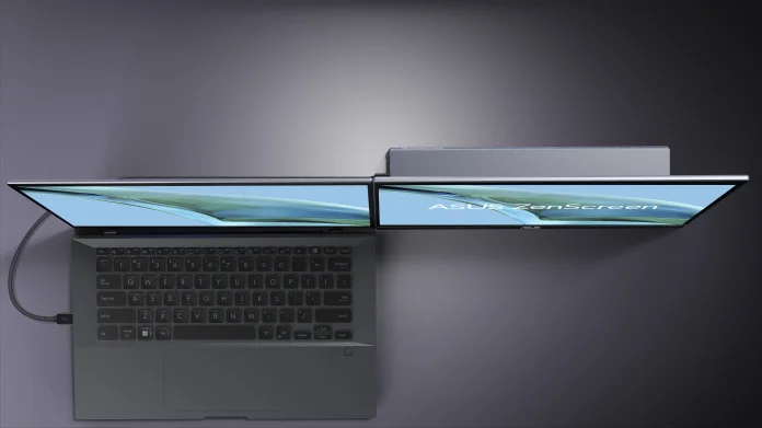 The ASUS ZenScreen MB16QHG aligned closely to a laptop for seamless usage