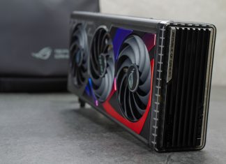 The ROG Strix GeForce RTX 4070 Ti graphics card on a marble surface with an ROG backpack in the background