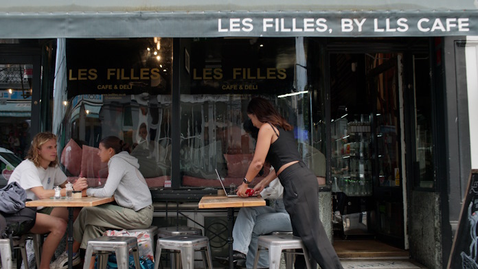The busy outdoor seating area of the Les Filles Kitchen 