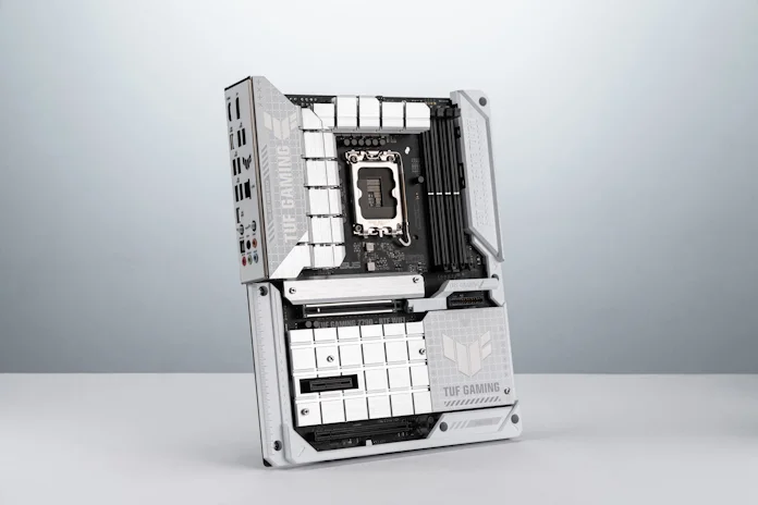 A front view of the TUF Gaming Z790-BTF WiFi motherboard on a white table