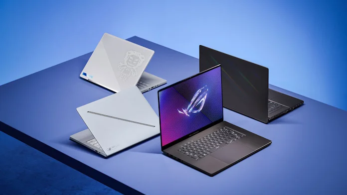 The 2024 lineup of ROG gaming laptops arranged on a blue table