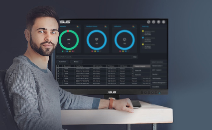 An IT specialist using ASUS Control Center Express software for real-time monitoring and management