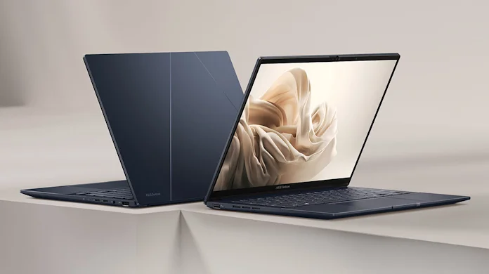 Two ASUS Zenbook 14 OLED laptops