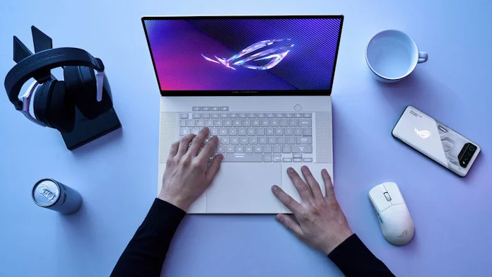 A person using the ROG Zephyrus G14 laptop
