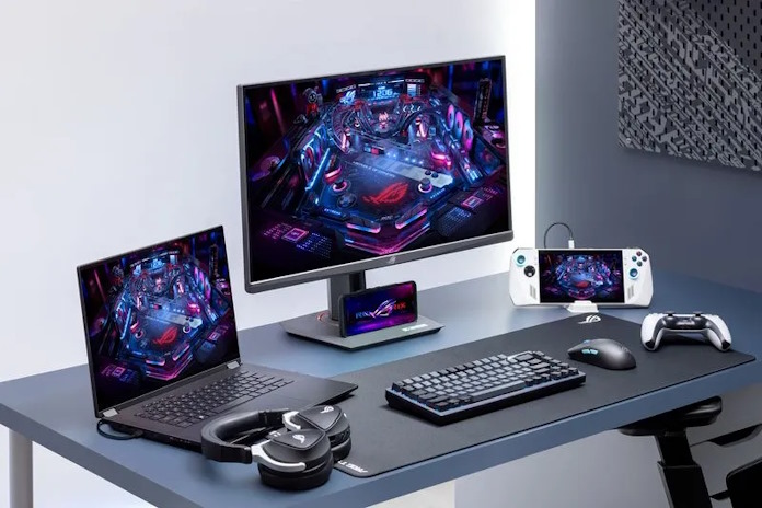 A full gaming PC setup featuring the ROG Strix XG27ACS gaming monitor