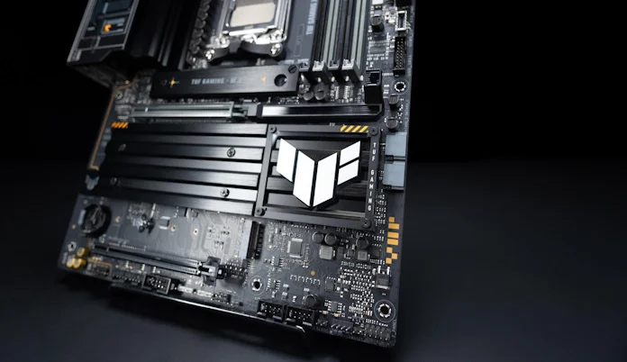 The TUF Gaming X870-Plus WiFi motherboard, a closeup of its chipset heatsink and PCIe 5.0 x16 slots